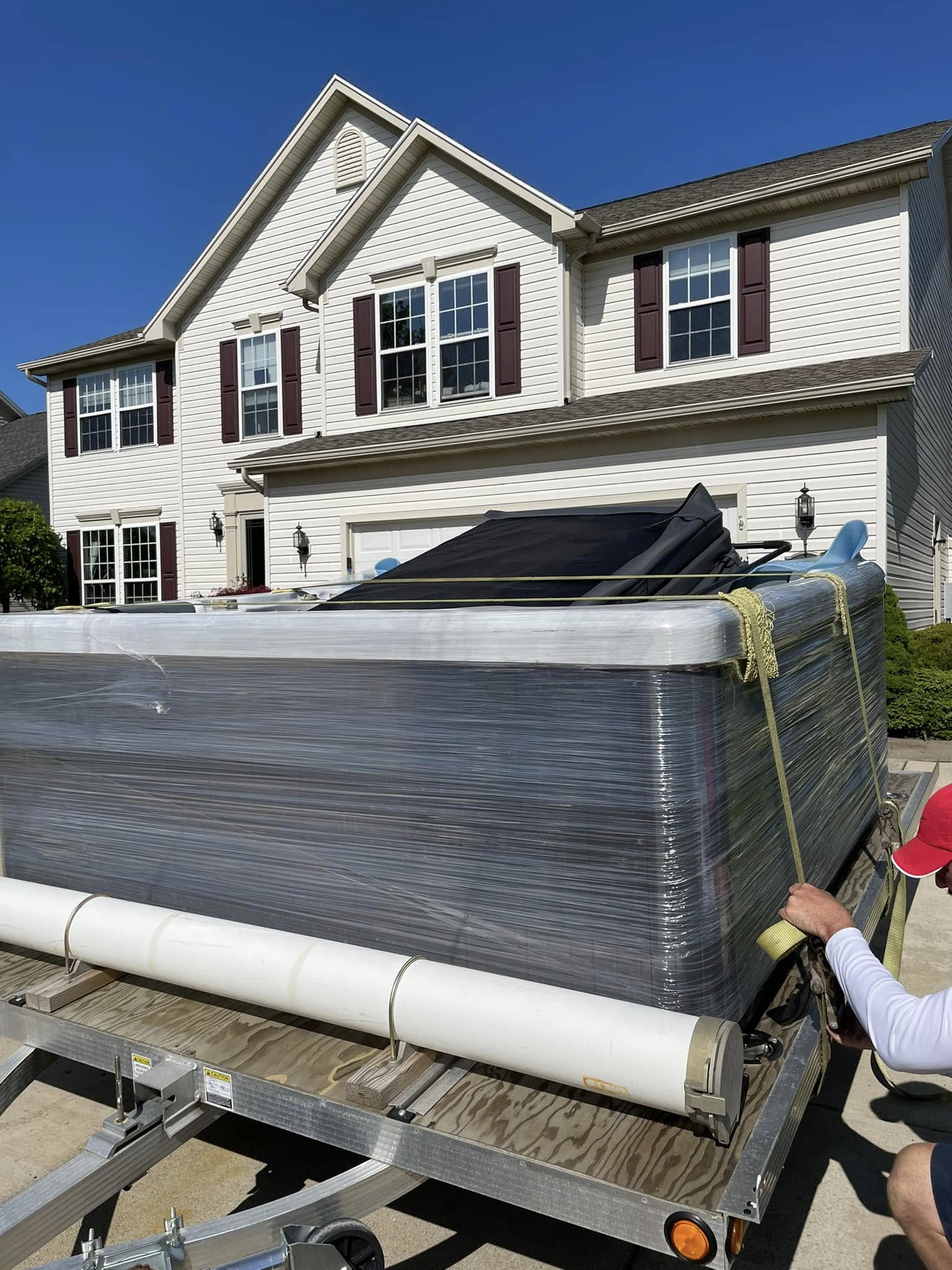 Another view of a hot tub on the truck ready for delivery